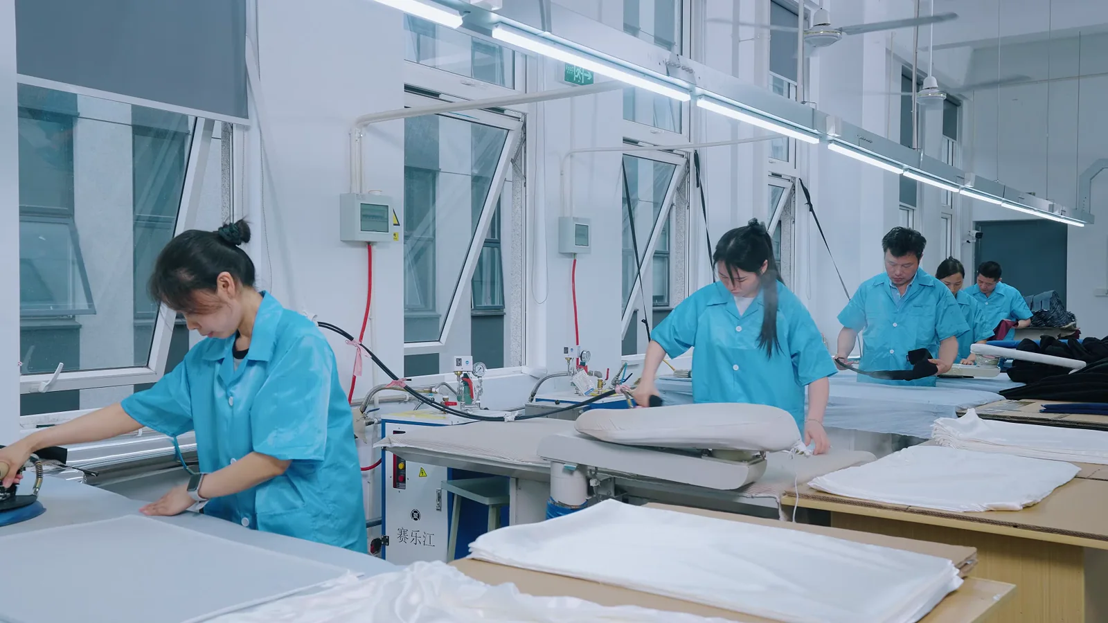 Stitch Silk production team working inside the garment finishing workshop