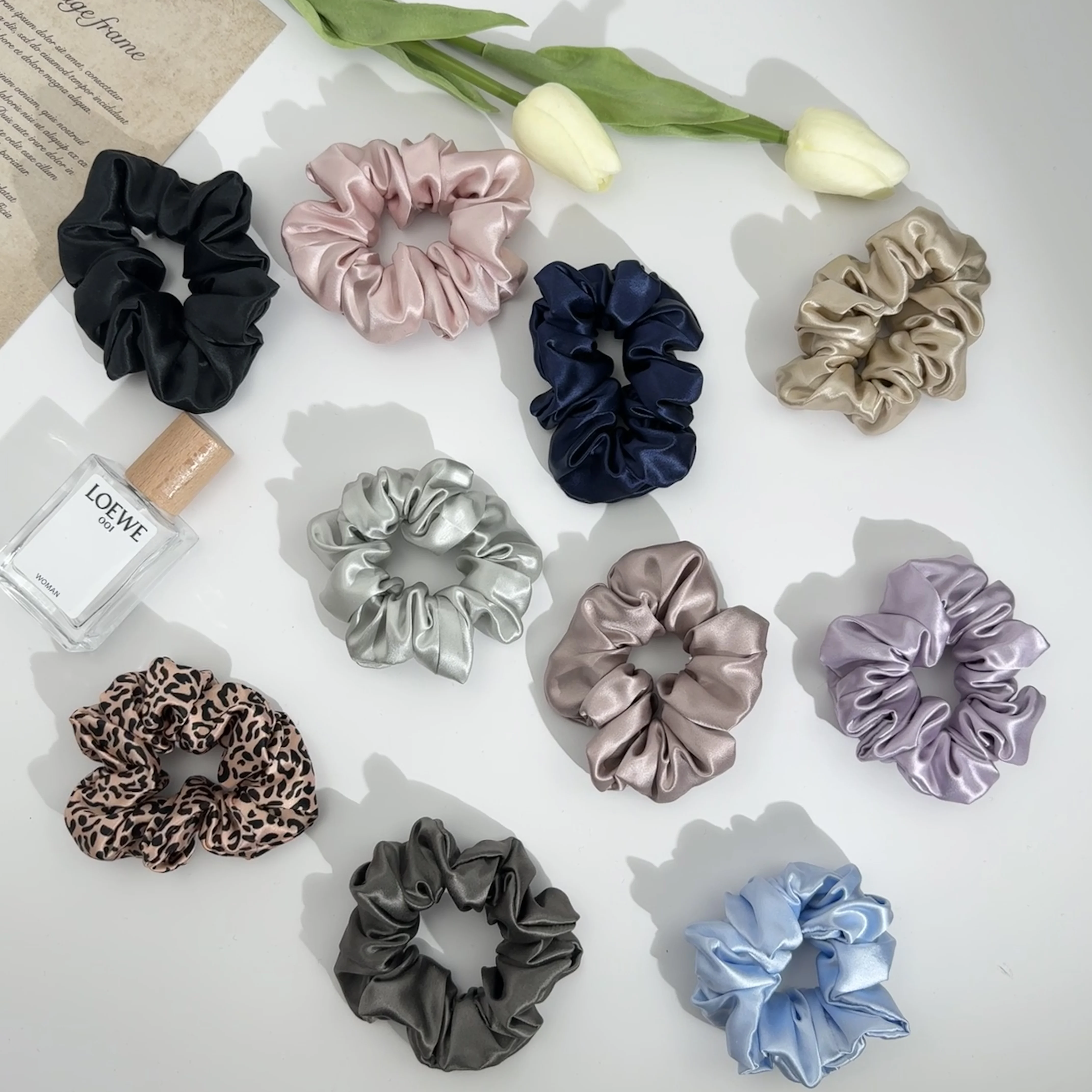 Multi-color silk scrunchie collection arranged for palette review
