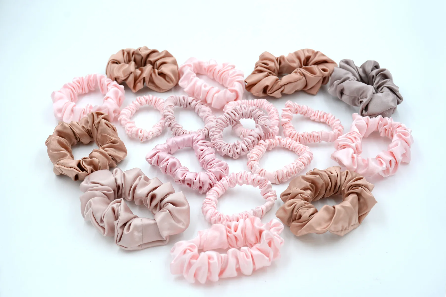 Mixed-width silk scrunchies showing skinny and full silhouettes