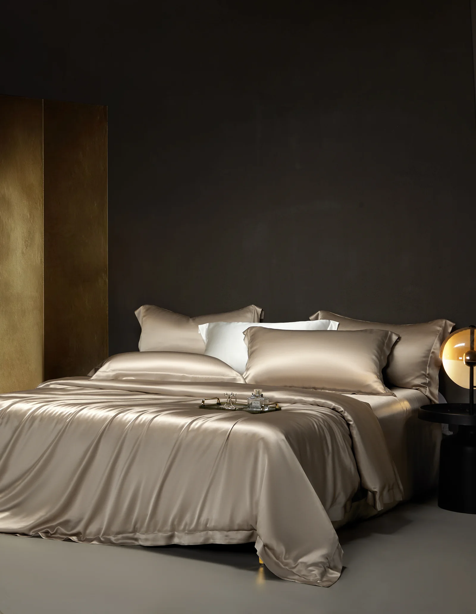 Champagne silk duvet cover and matching pillows in the Stitch bedding collection