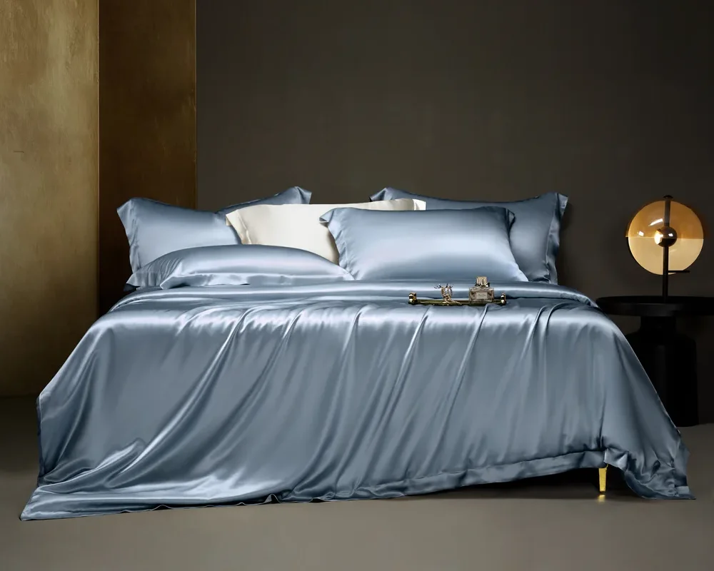 Sky-blue silk duvet cover and matching pillowcases