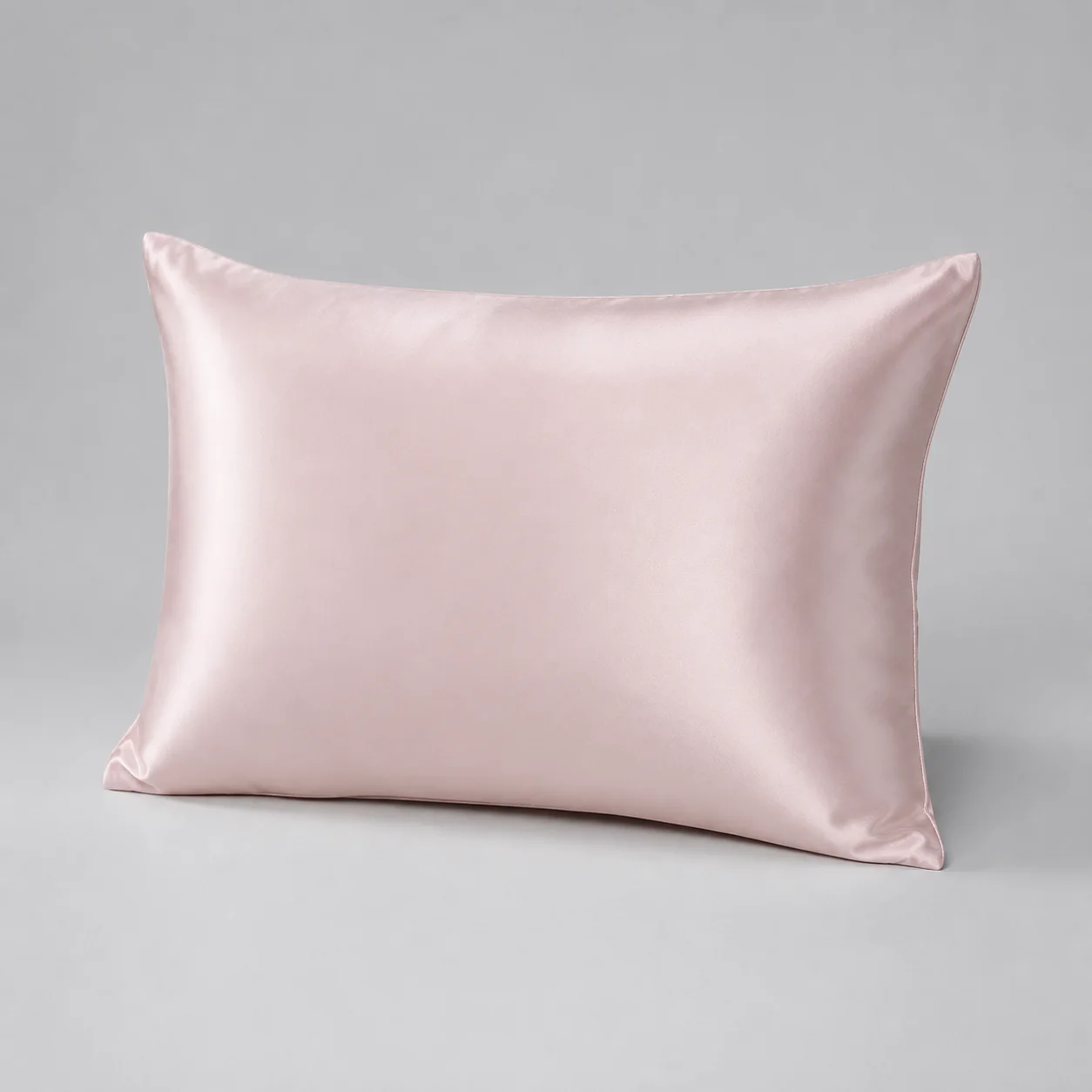 Blush silk pillowcase shown from the front