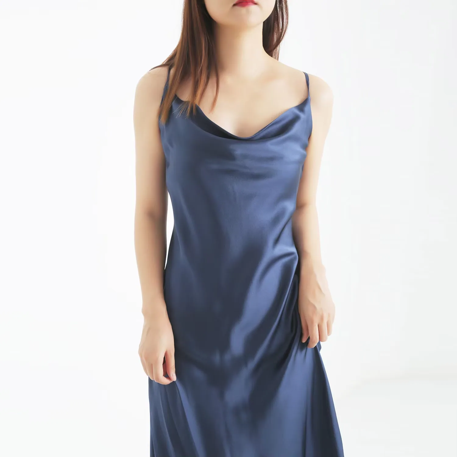 Navy silk slip dress neckline and drape detail