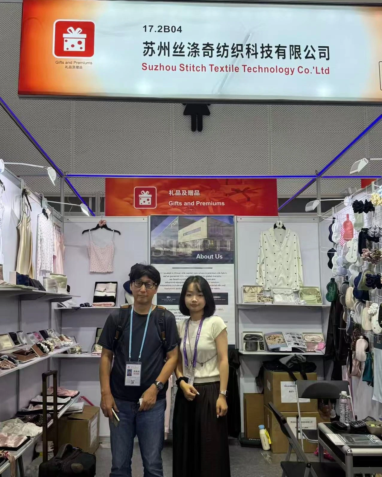 Sample bags and cartons packed at the booth entrance before teardown